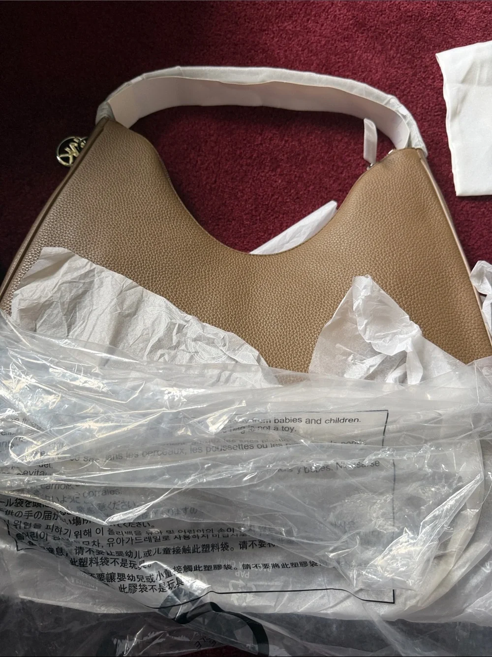 Tory Burch Tan Pebbled Leather Hobo with Logo Accent